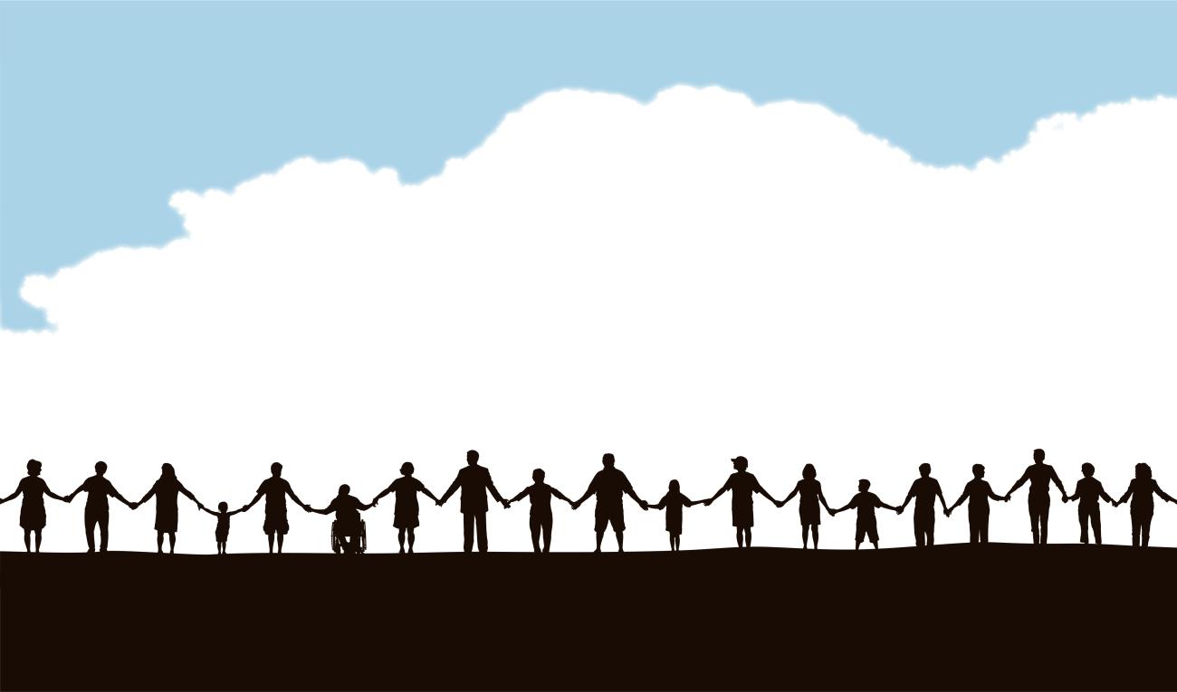 Image of community members holding hands in a line