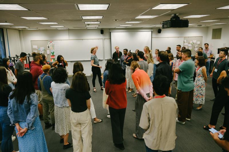 Stanford lecturer Lisa Rowland leads master's students in an improv session. (Photo: Ryan Zhang)