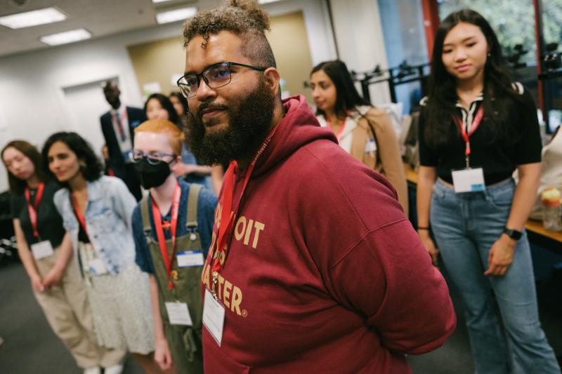 Master's students, including EDS student Michael Chrzan (foreground), look on during an improv session. (Photo: Ryan Zhang)