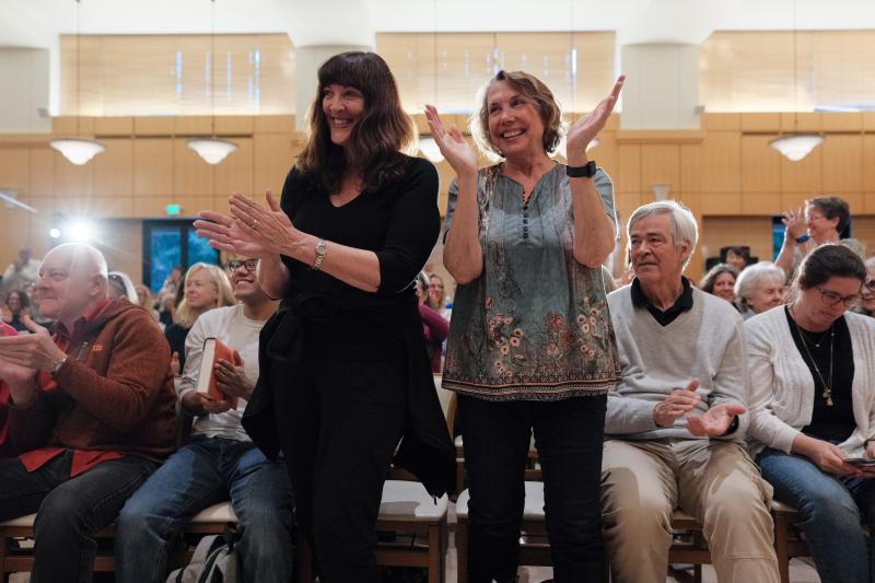 Women clap following the discussion between Associate Professor Christine Min Wotipka and author Bonnie Garmus. The annual Stanford Graduate School of Education Cubberley Lecture is a public forum for important topics in education. (Photo: Ryan Zhang)
