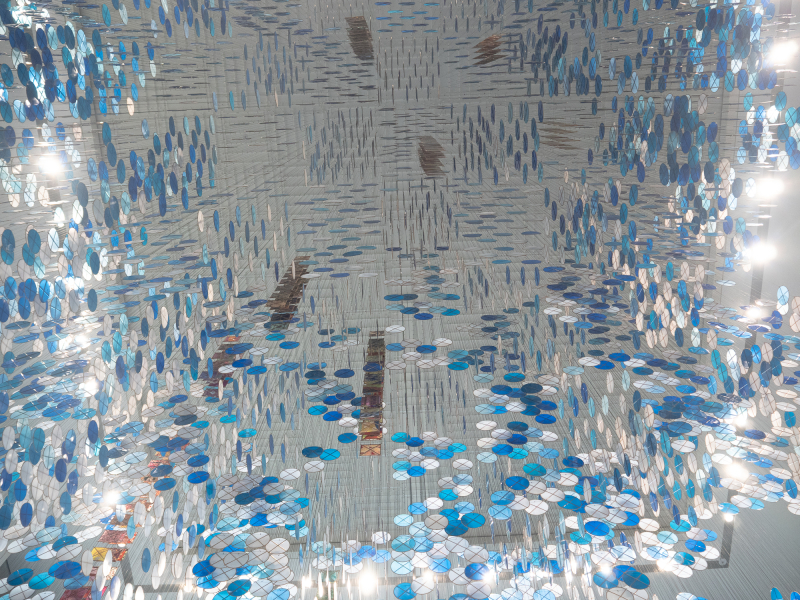 Made from handmade washi paper and supported by thin bamboo frames, the installation includes circular blue and white kites, as well as square graphic kites. (Photo: Taylor Jones