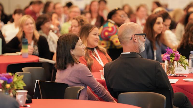 Liz Simons (center), chair of the board of the Heising-Simons Foundation, and Philip Fisher, GSE professor and director of the Stanford Center on Early Childhood, look on as panelists discuss challenges in early childhood math education. (Photo: Marc Franklin)