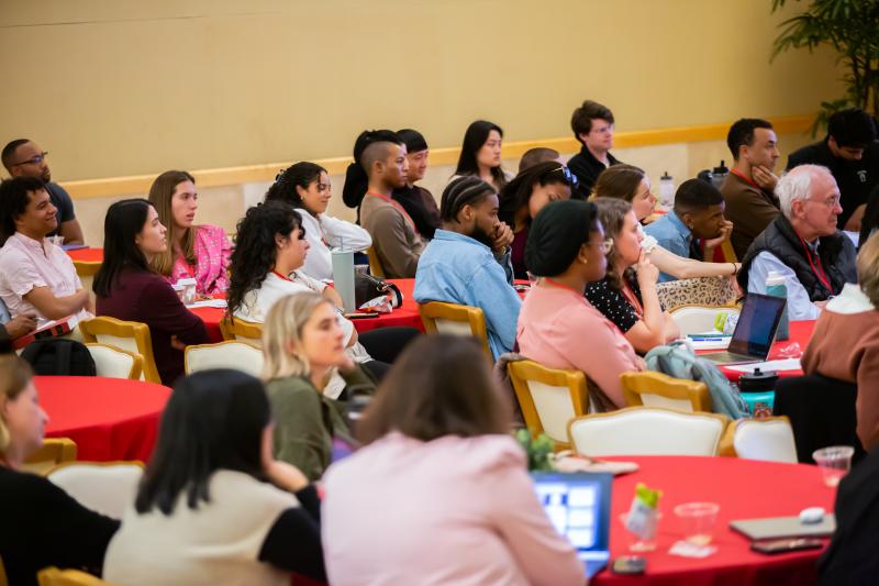 Attendees look on during the conference commemorating the 70th anniversary of the Supreme Court ruling. (Photo: Christine Baker)