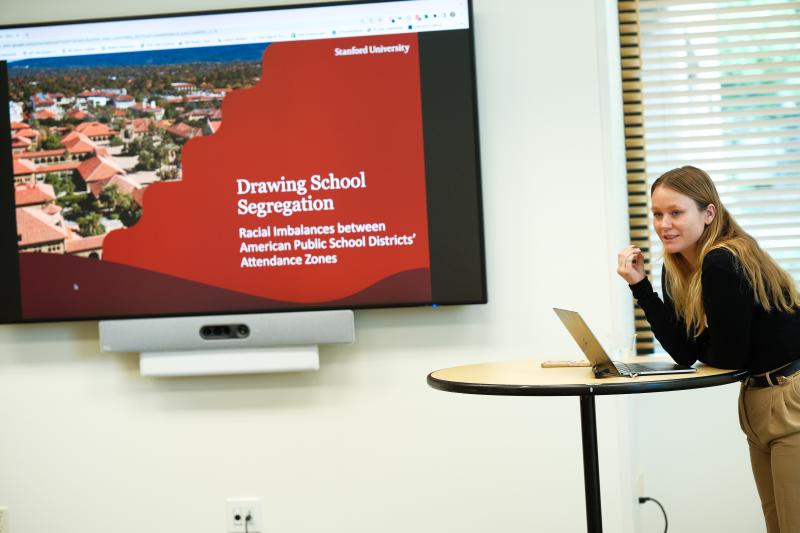 Master's student Lucy Caffrey-Maffei presents her research. (Photo: Ryan Zhang)