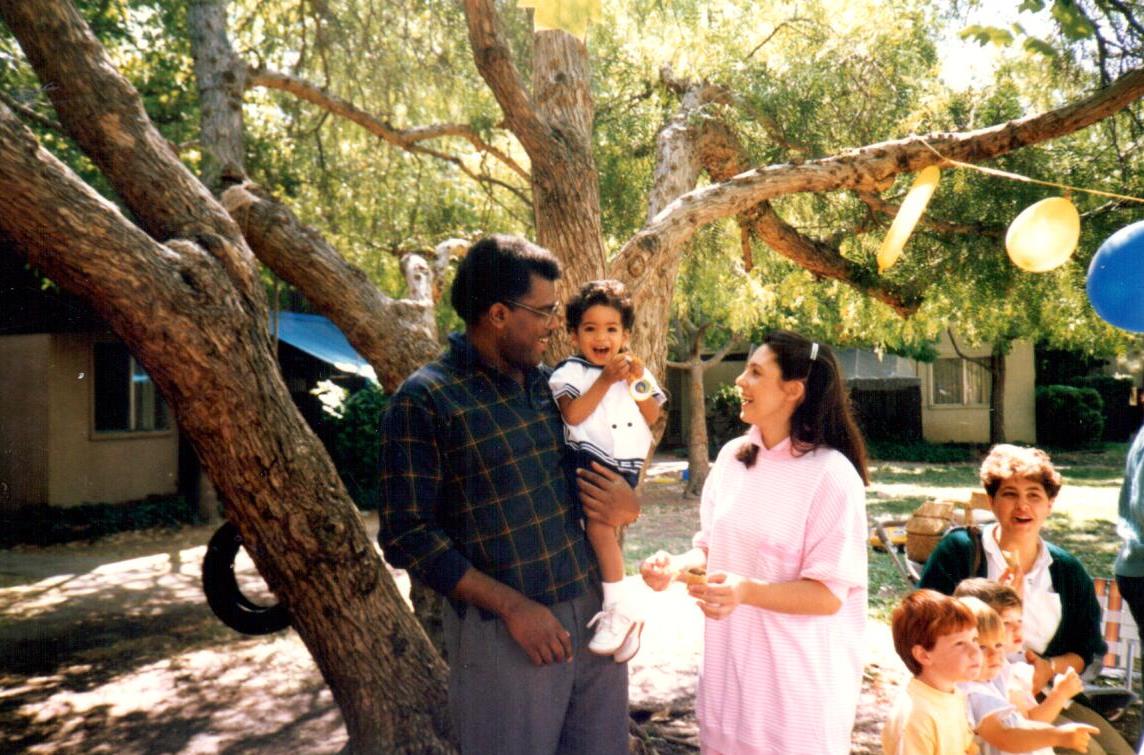 Jonathan Jansen and wife Grace (center) hold a birthday party for son Mikhail at their Stanford graduate residence, 141B Escondido Village.