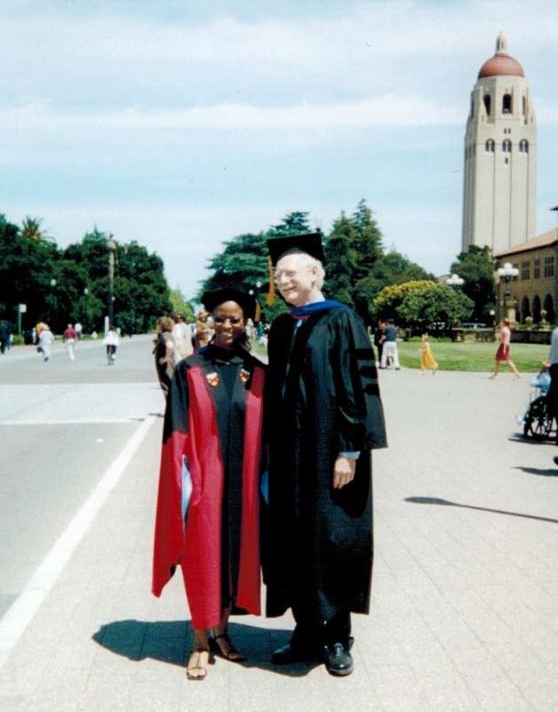 Carla Pugh with Decker Walker, professor of education, during Stanford's 2001 commencement.