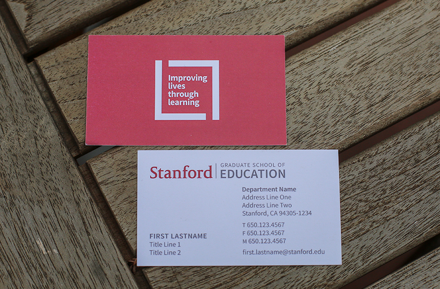 Photo of Stanford Graduate of Education business cards with Improving lives through learning signature on back