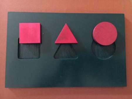 a simple toy with basic shapes.