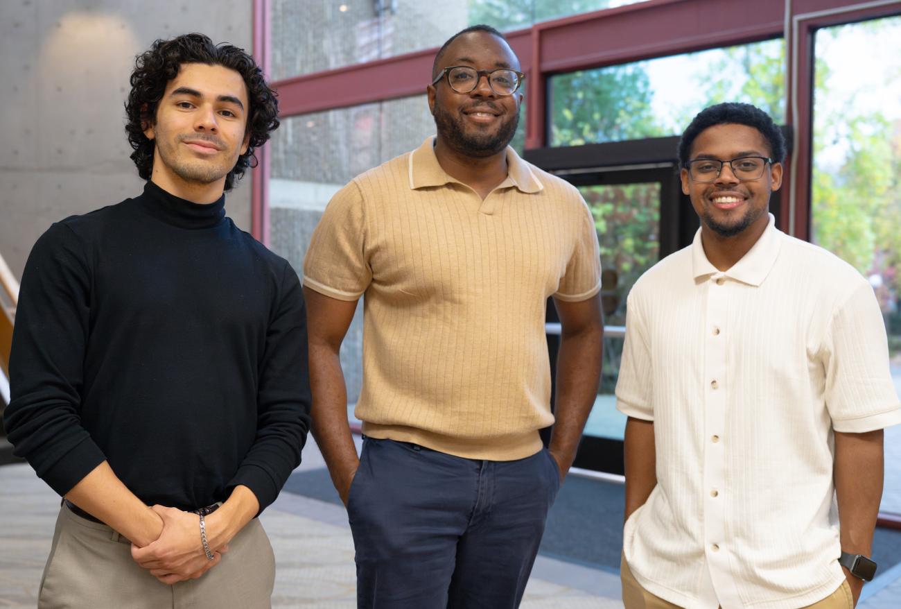 Stanford GSE assistant Professor Mike Hines (center) with STEP students Emilio Luna (left) and De’Jshon Maxwell-Garcia (right), who took his pilot course on the history of education in California.