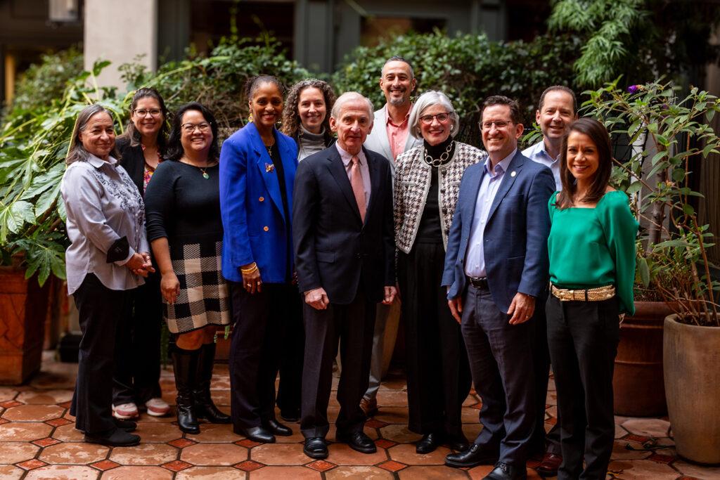 President Richard Saller greeted Sunnyvale School District Superintendent Michael Gallagher (third from right); Professor Ira Lit (second from right), the faculty director of the teacher program; and Ruth Ann Costanzo (fourth from right), STEP director of clinical work, K-12; and their teams. (Image credit: Peggy Propp)
