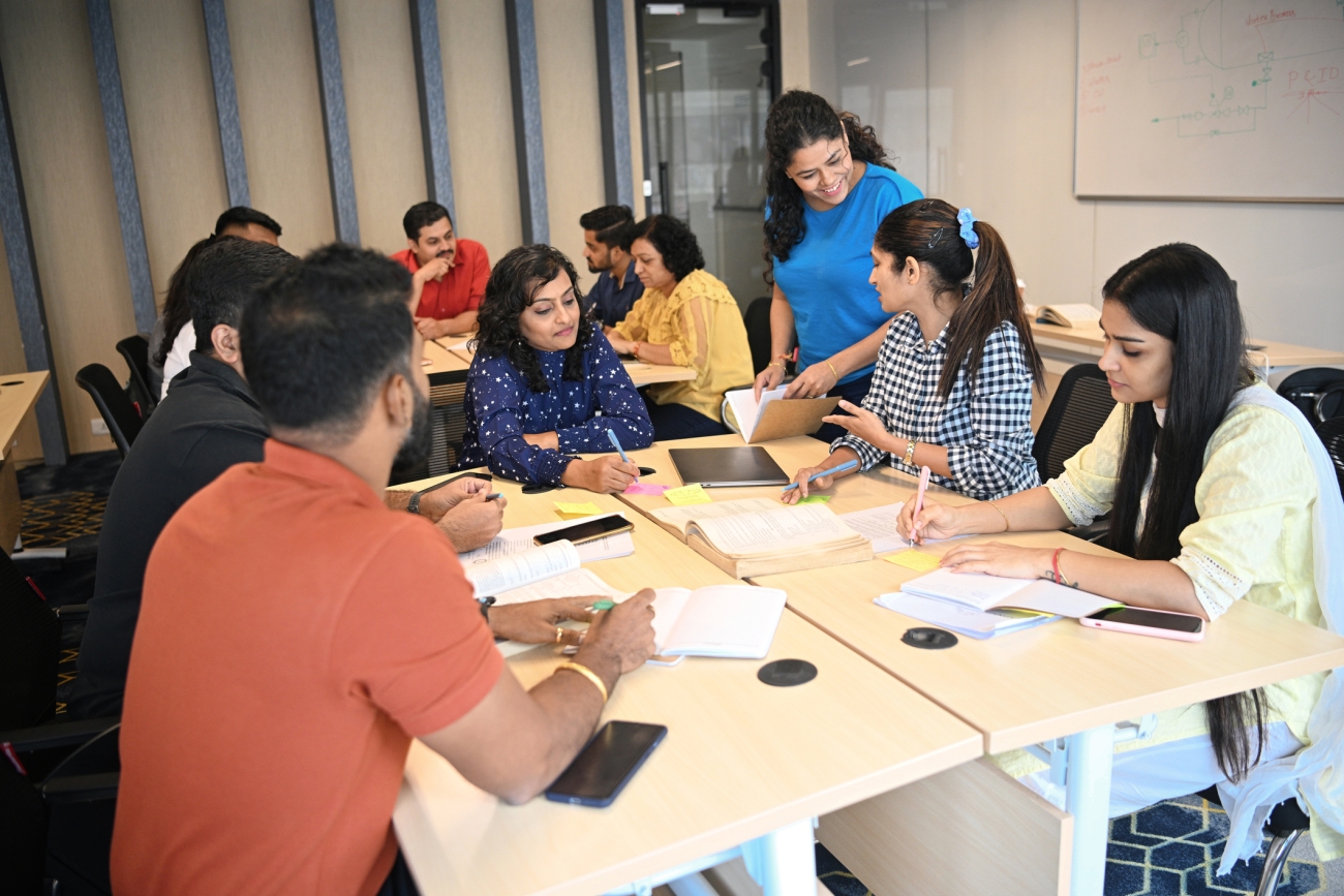 Class of students in India working together