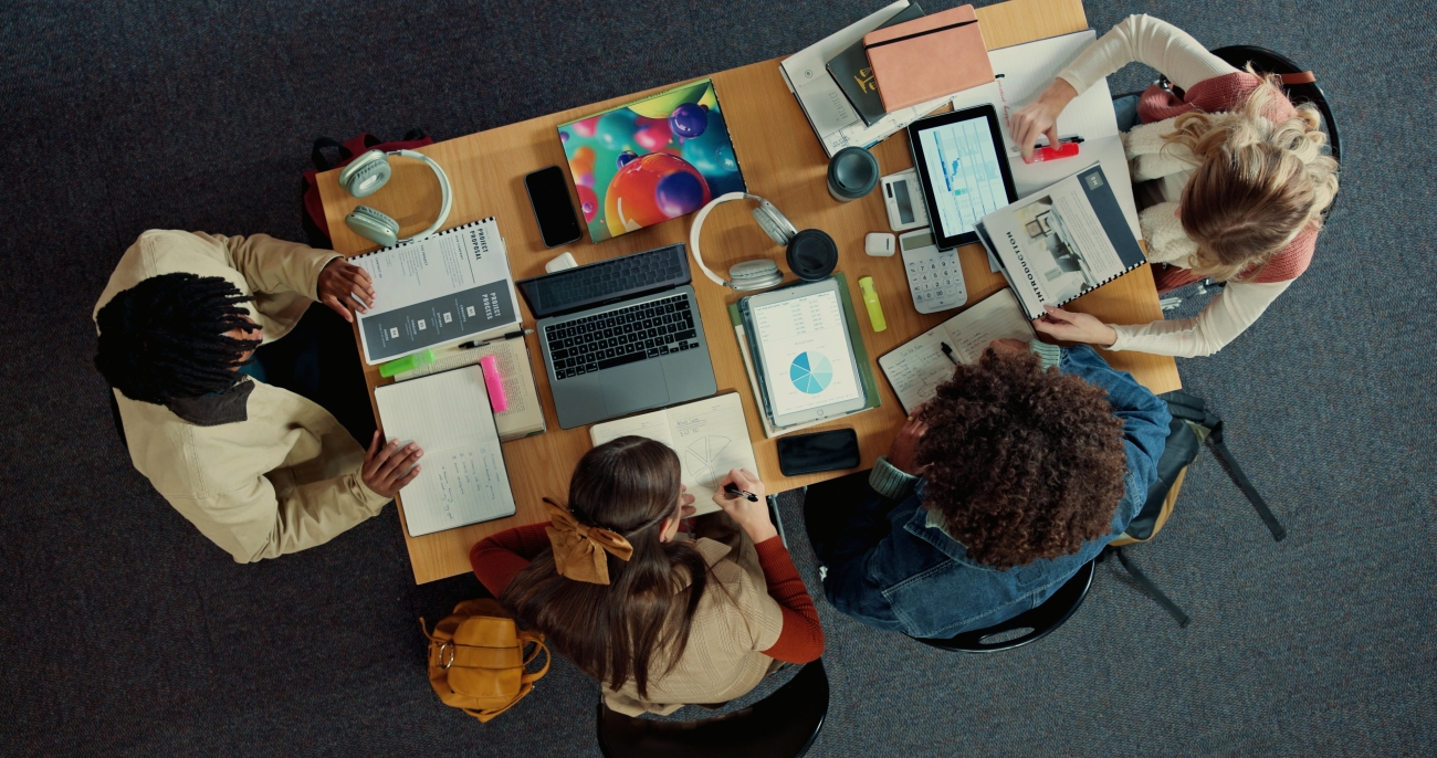 bove, study group and college with friends in library for research project, team or education.